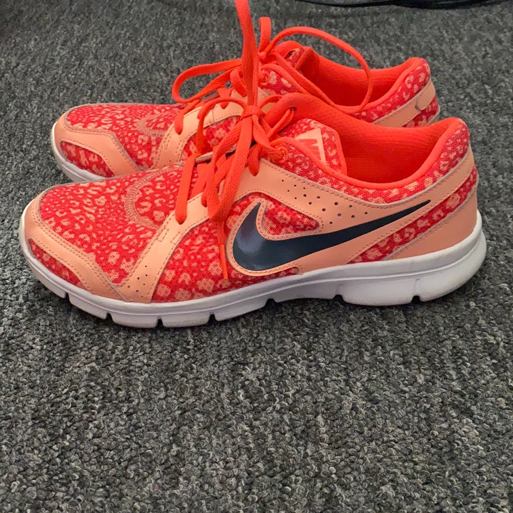 Nike pink leopard athletic shoes. Like new, only worn a few times.